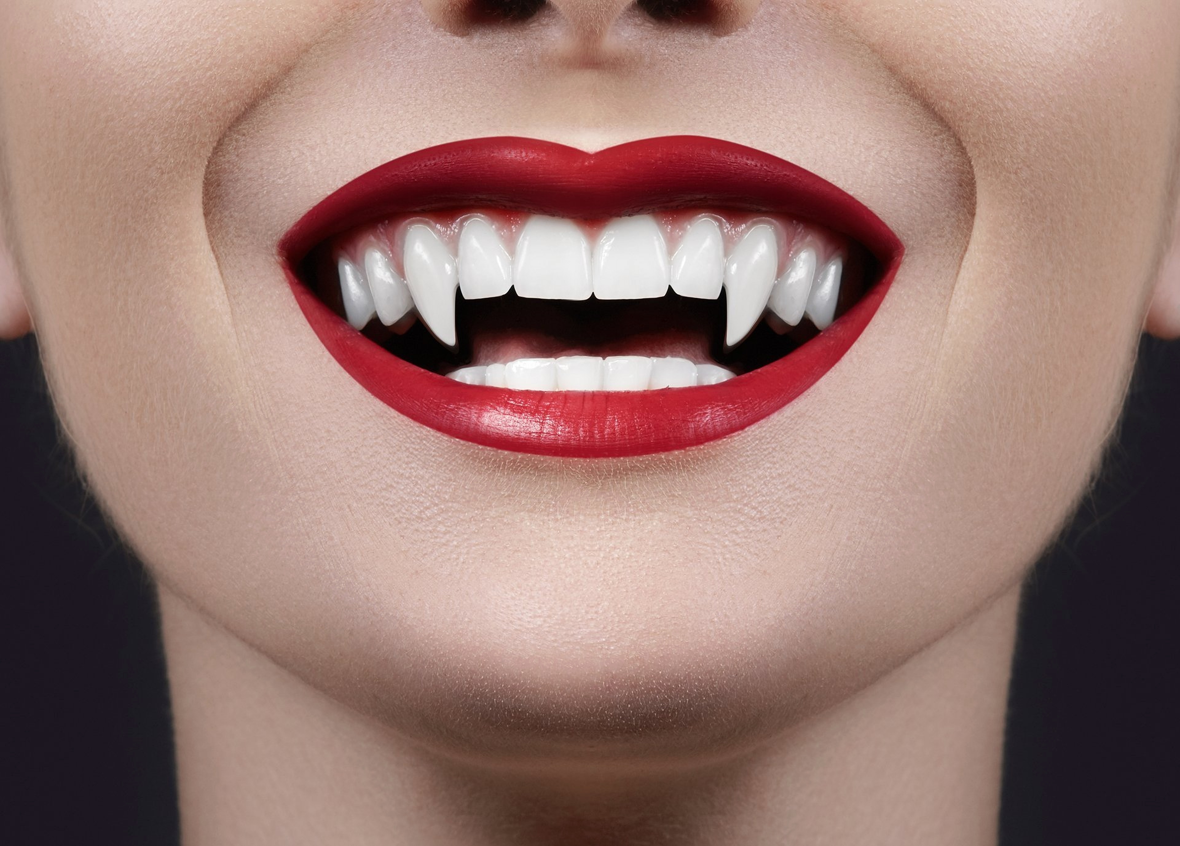 Illustrative example of vampire fang dental implants from Google Search