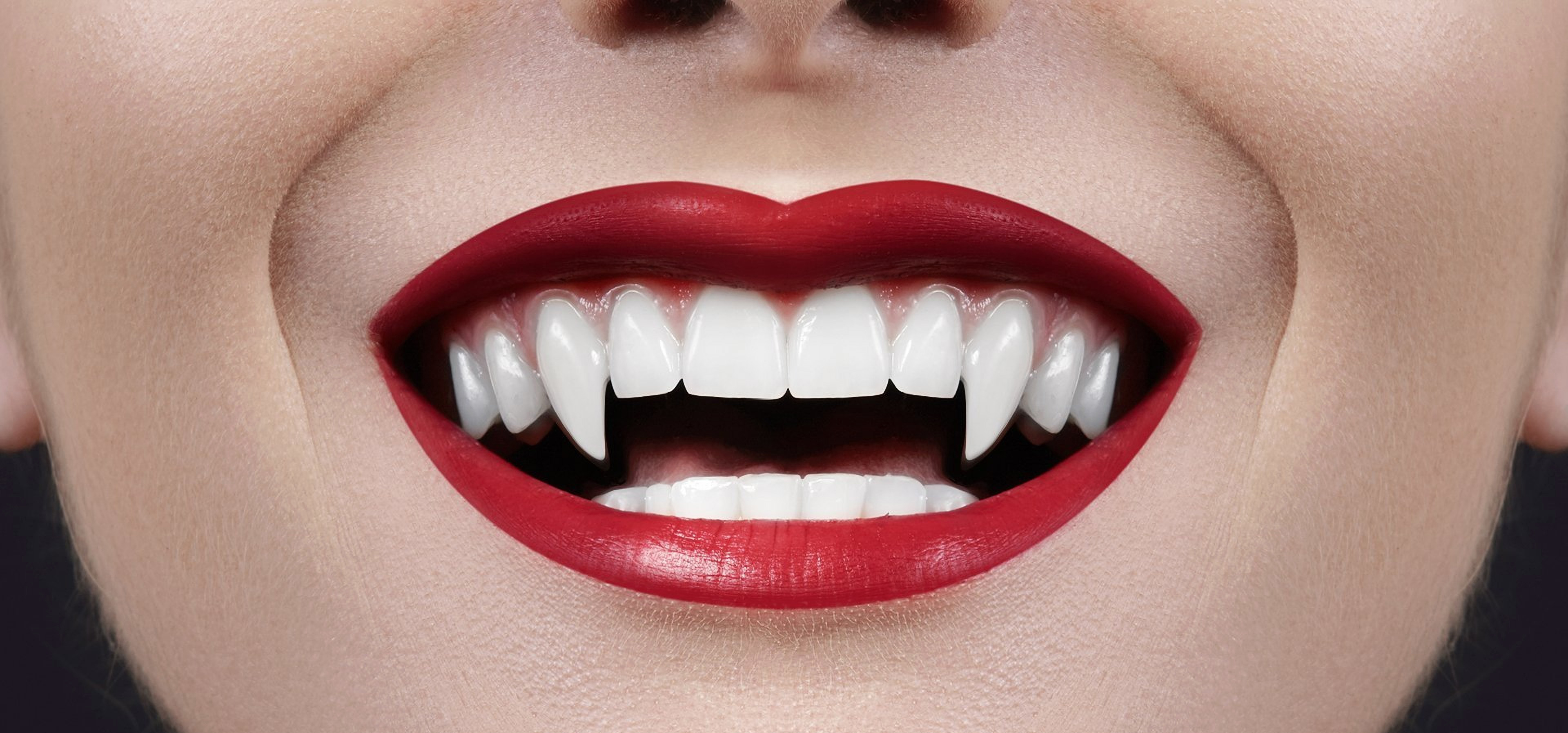 Illustrative example of vampire teeth dental implants from Google Search